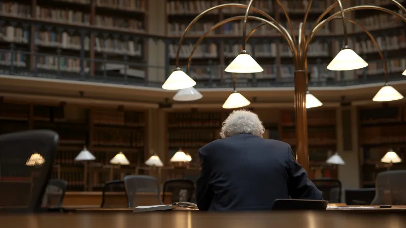BTS image of Professor David Carpenter in the Maughan library (back of his head) (1)