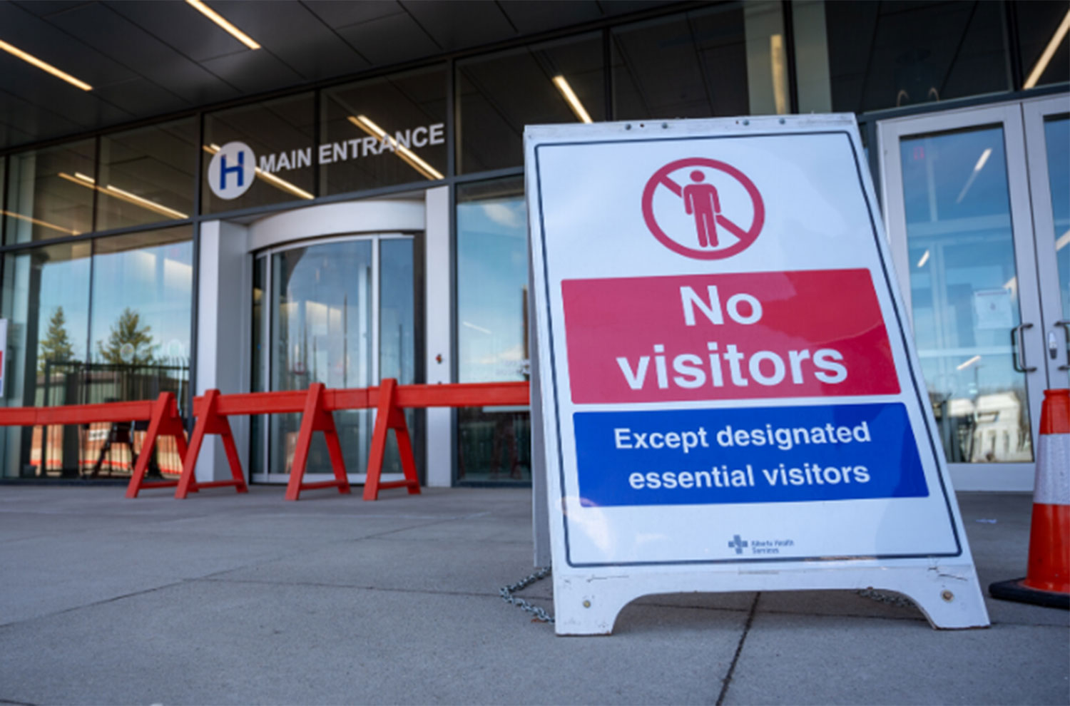A no visitor sign at a hospital