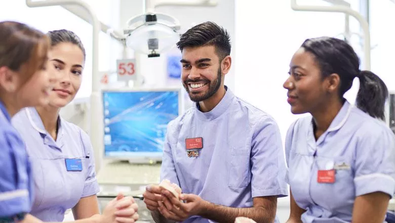Dentistry students chat and smile