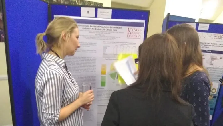 Dr Lesley Henson and her award winning poster.