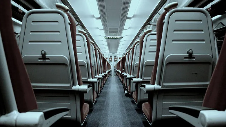 View down an empty train aisle