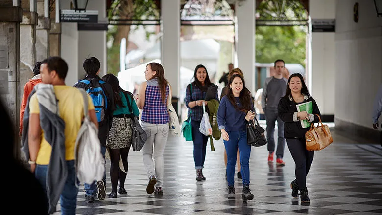 Students walk across Guys campus
