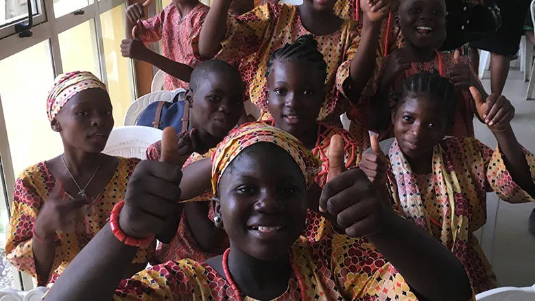 Happy schoolchildren take a selfie