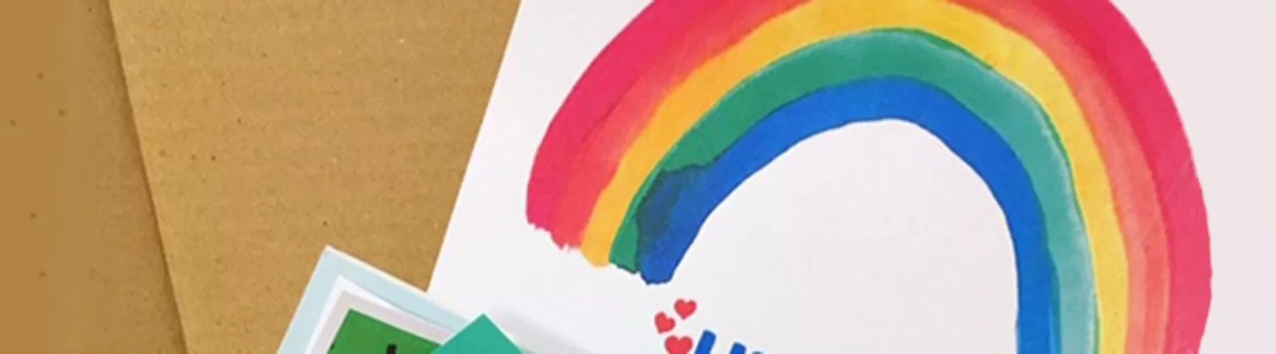 A handpainted rainbow in a cardboard box