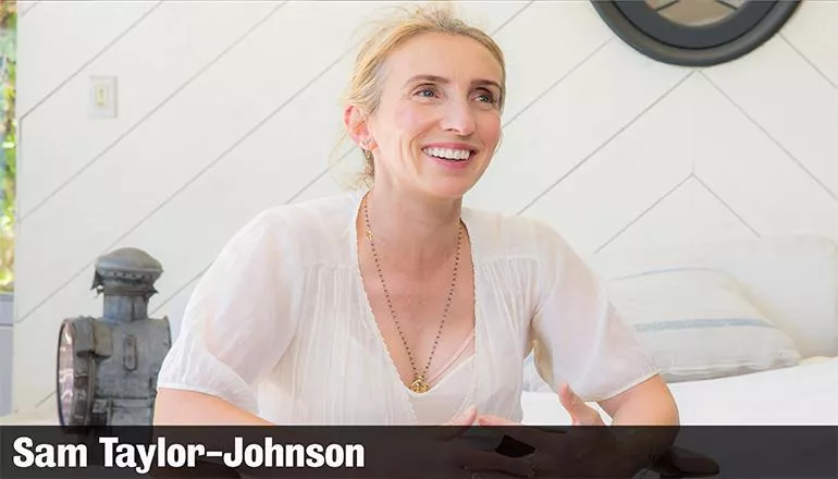 Image of Sam Taylor-Johnson wearing white top and smiling