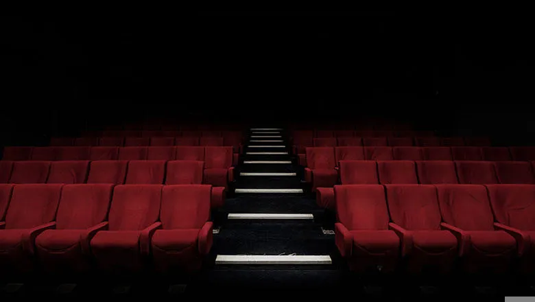 Darkened theatre seats