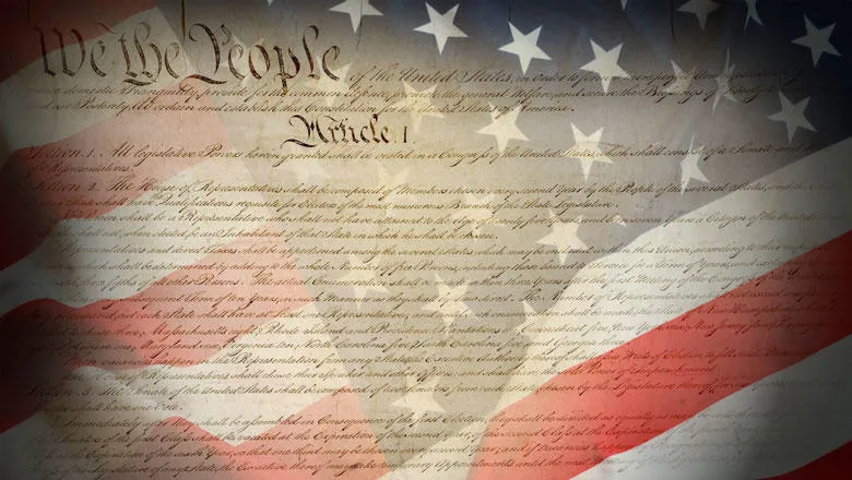 US constitution overlaid on American flag