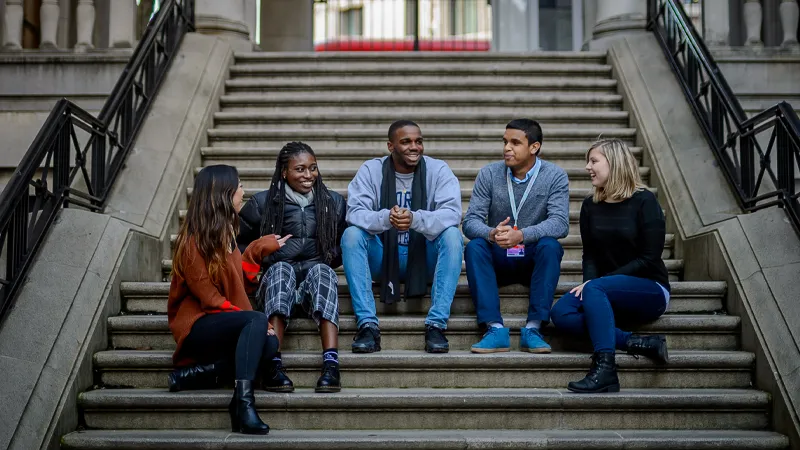 Students sitting on steps