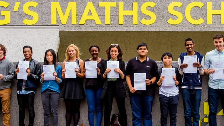 Pupils outside King's Maths School holding their exam results