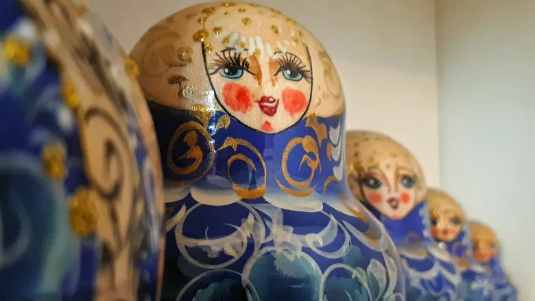 Row of blue Russian dolls.
