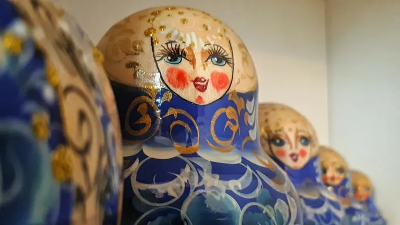 Russian dolls in blue and gold colour