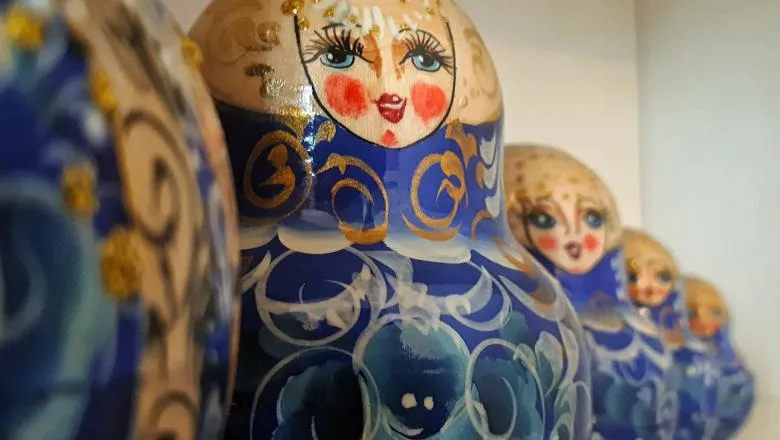 Russian dolls in blue and gold colour