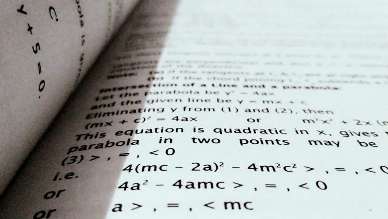 An open book displaying mathematical equations