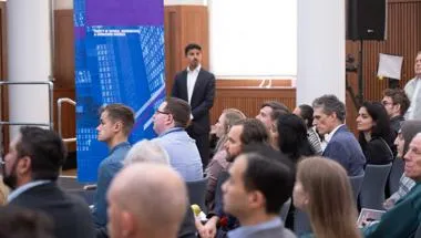 Audience listening to a presenter