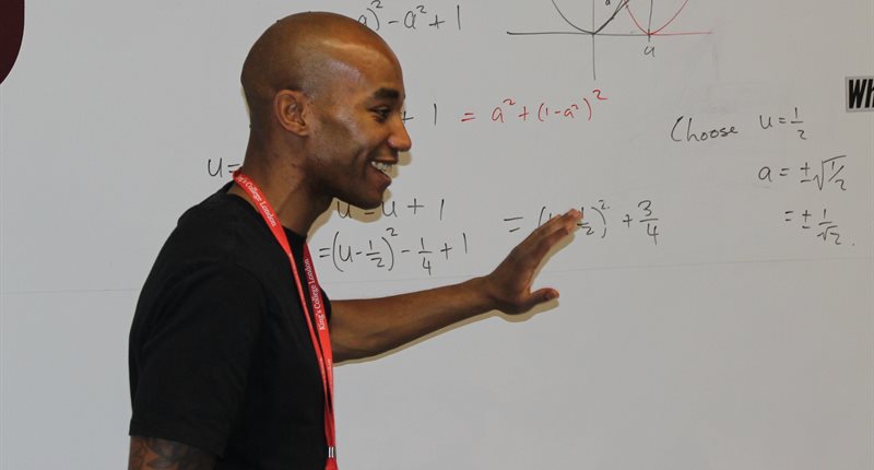 Tutor at whiteboard