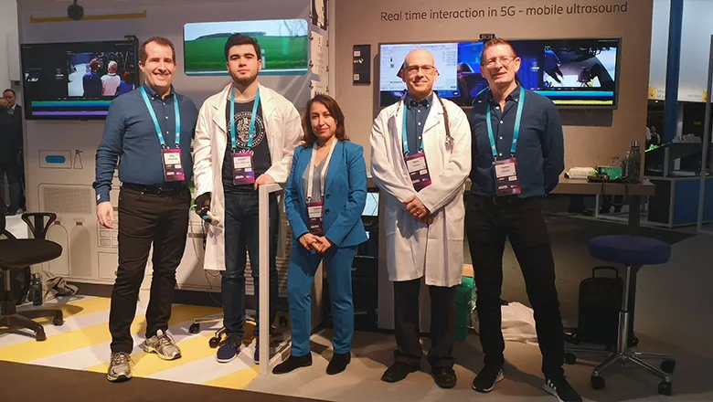 Dr Toktam Mahmoodi (centre) and the project team at MWC 2019