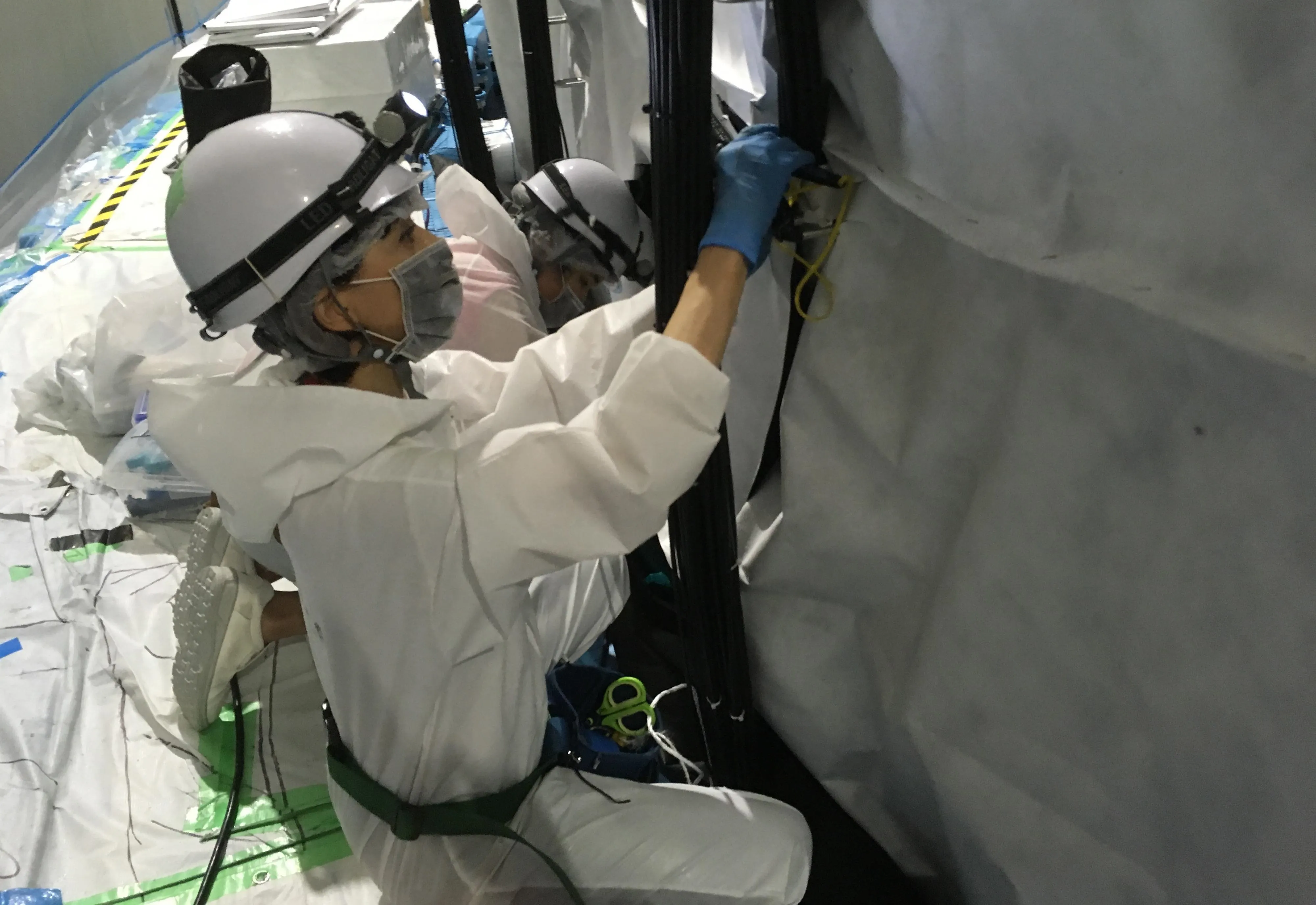 Professor Francesca Di Lodovico working inside the Super-Kamiokande detector 