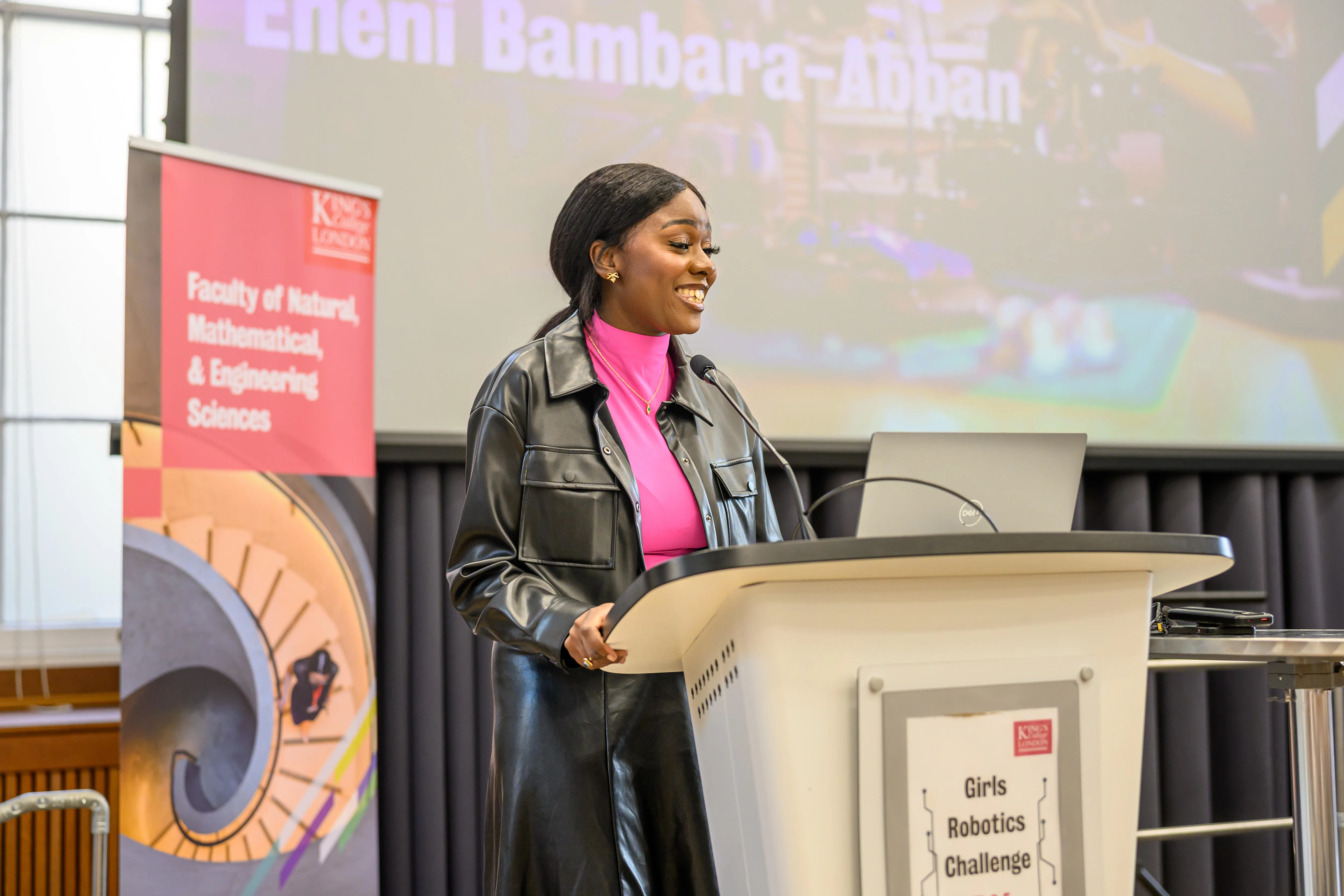 Woman talking on a podium