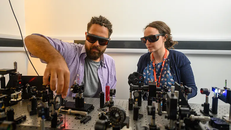 Researchers in the photonics lab