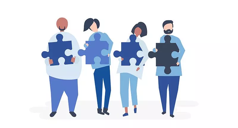 Illustration of people holding jigsaw pieces
