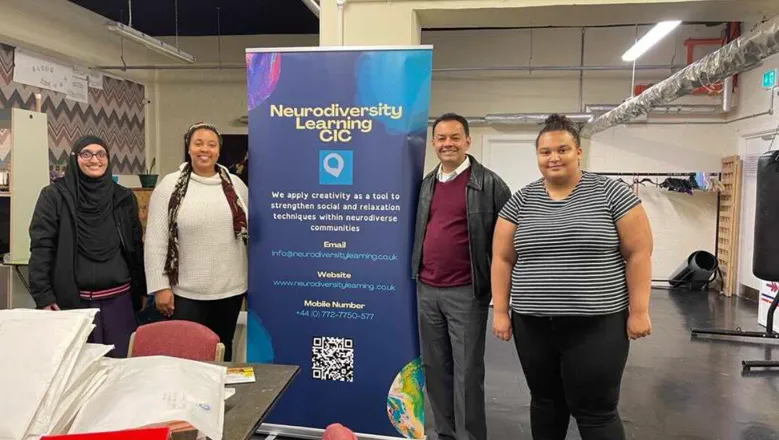 Kiaya (right) and Kaynath (left) with the Neurodiversity Learning CIC team