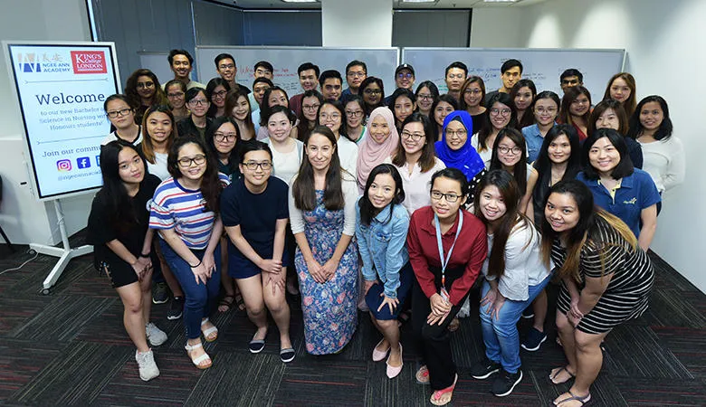 Julia with students in Singapore