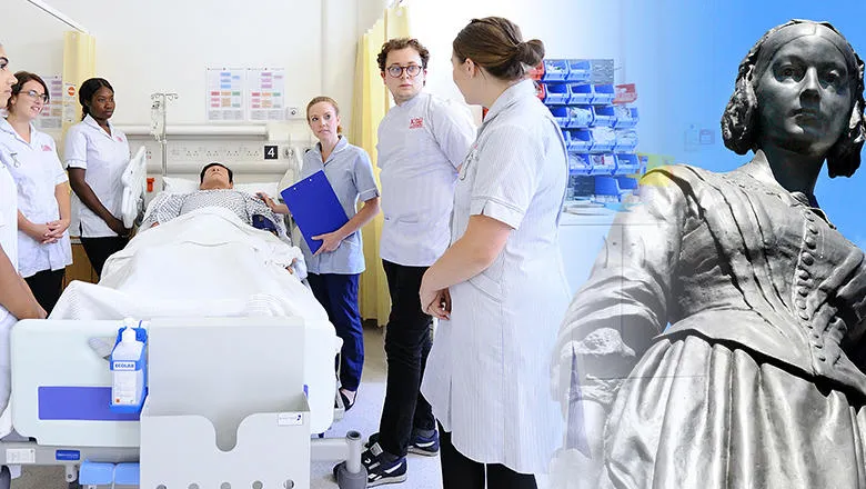 Nursing students next to a hospital bed and a Florence Nightingale statue