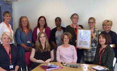 Department of Midwifery staff with the accreditation certificate.