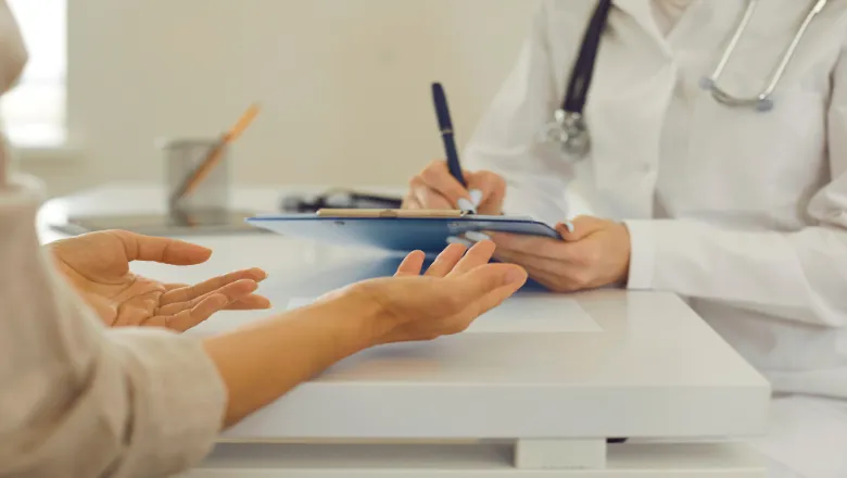 Patient and doctor in clinic