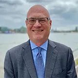 Headshot of man smiling 