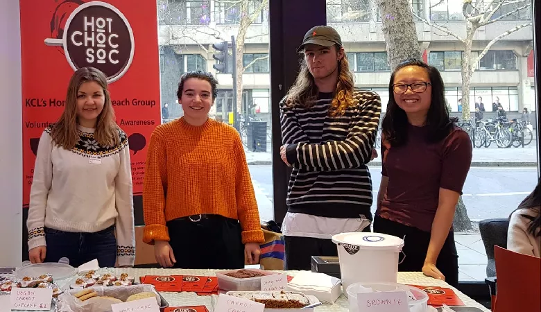 Student members of the Hot Chocolate Society at a fundraising event