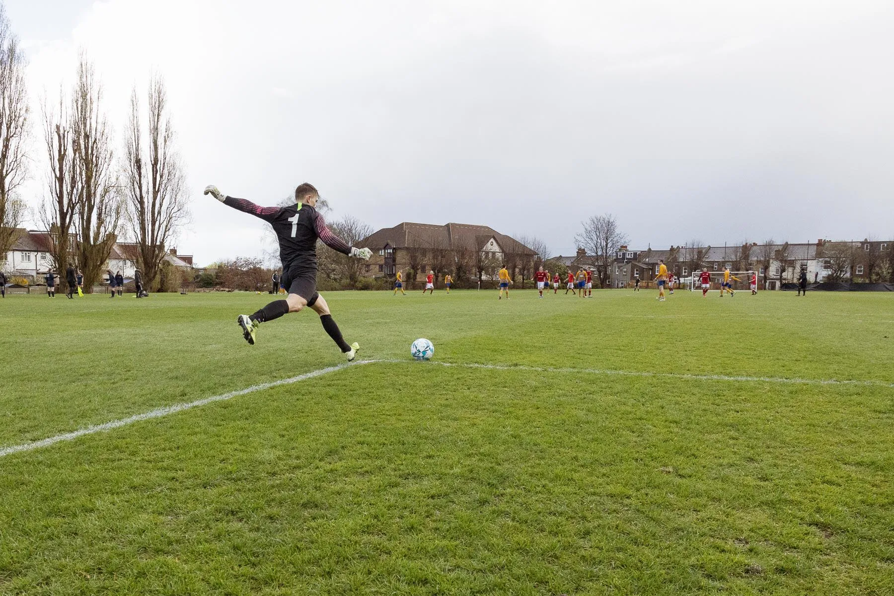 A group of men playing football