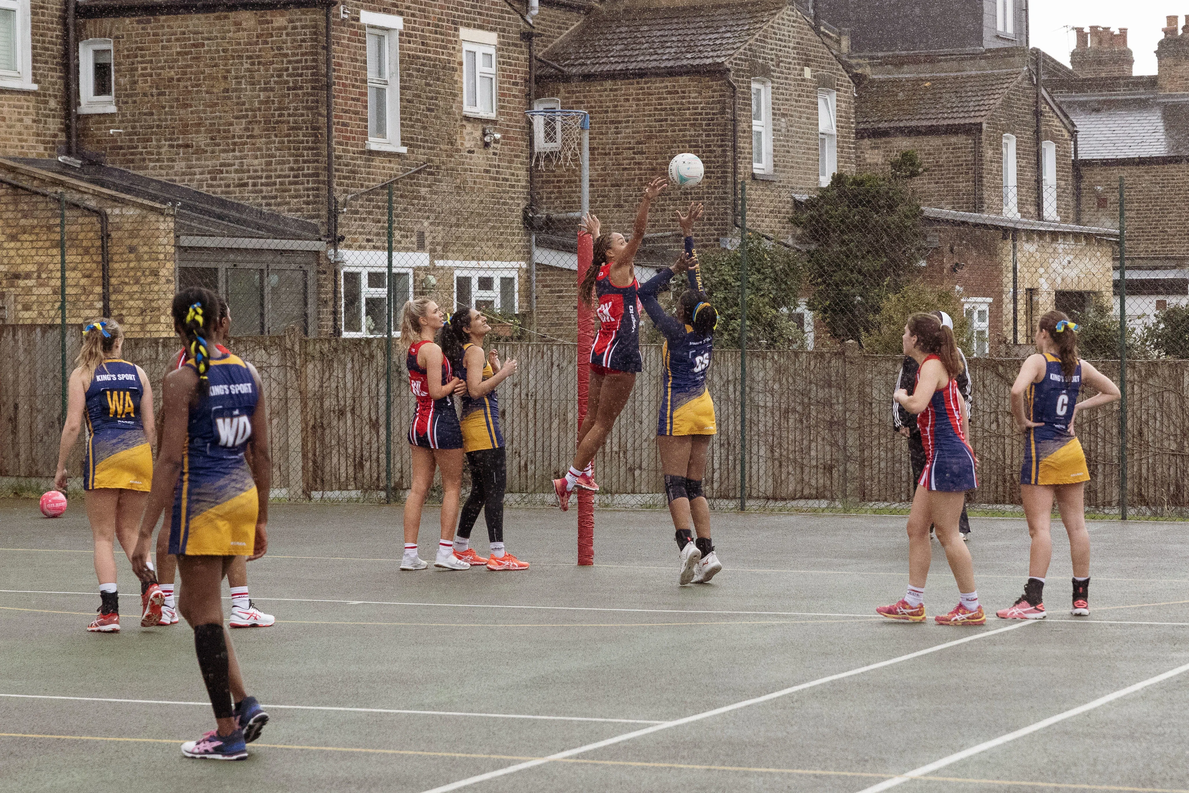 A group of women playing netball