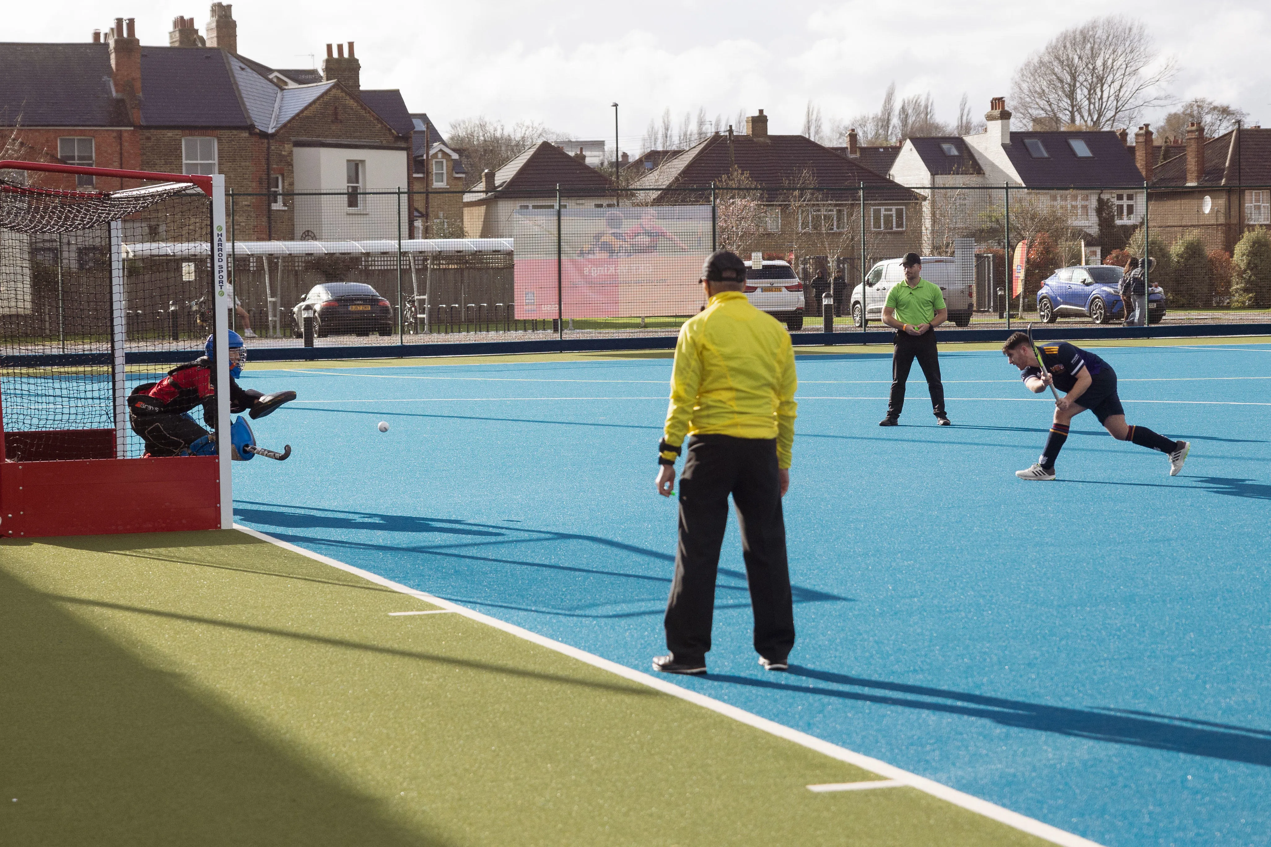 A group of men playing hockey