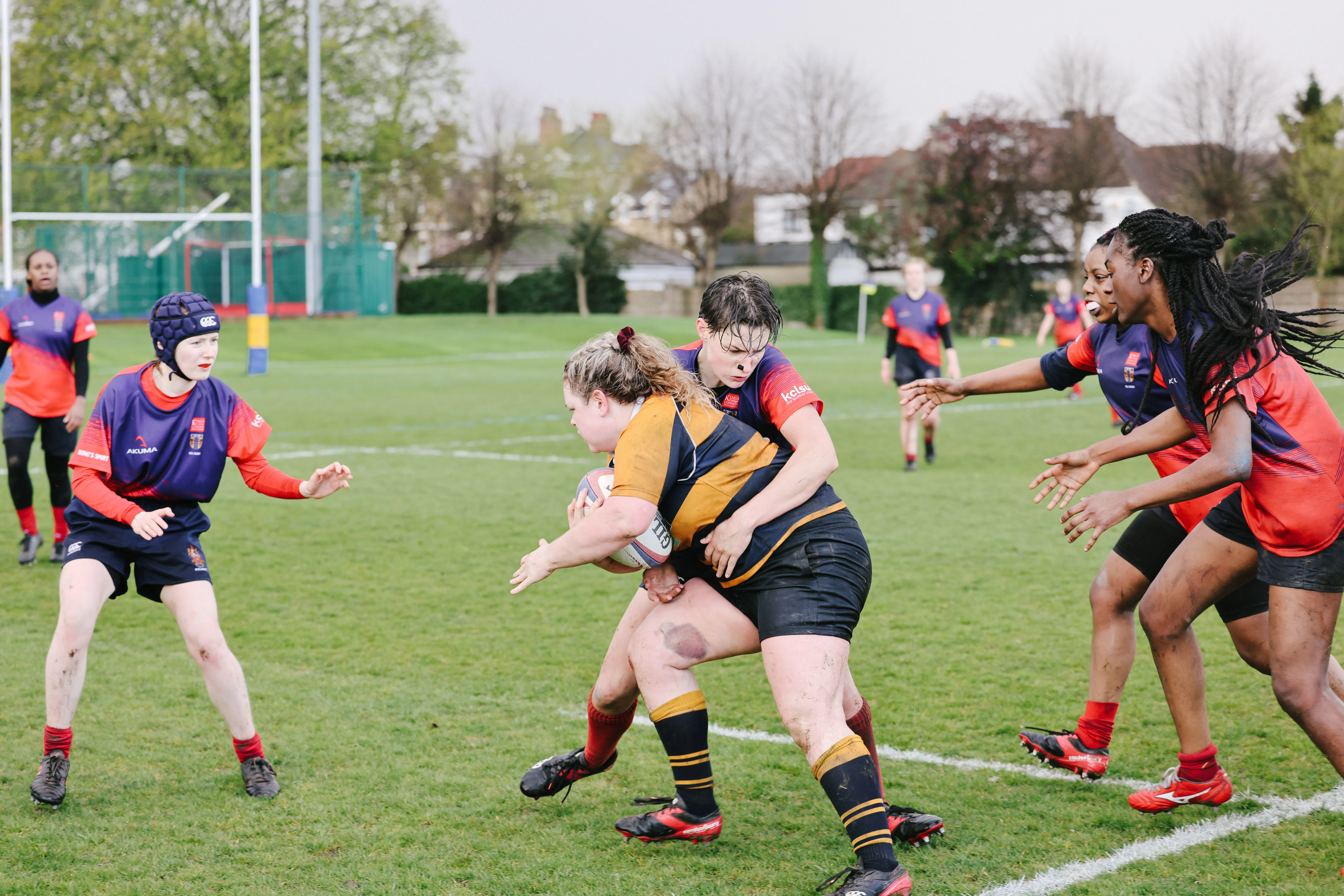 A group of women playing rugby