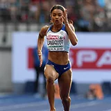Imani-Lara Lansiquot, A King's graduate (Psychology, 2020) and a sprinter, is pictured running in a professional athletic competition