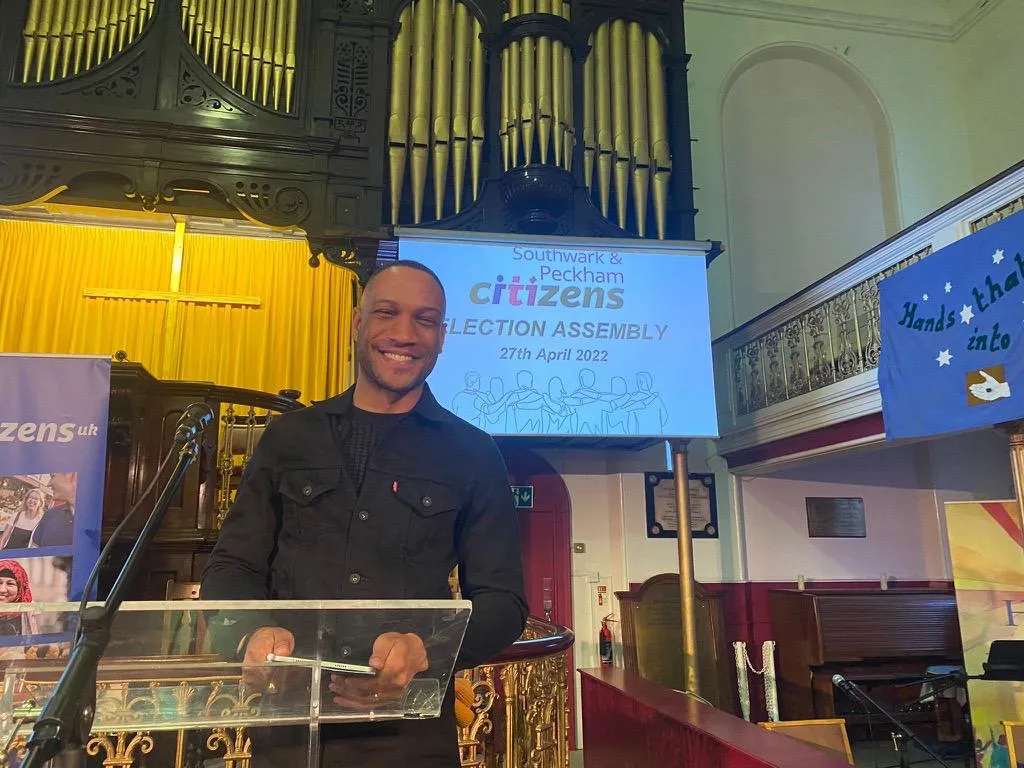 Image of Akeem Omar Ali presenting at the Southwark and Peckham accountability assembly. 