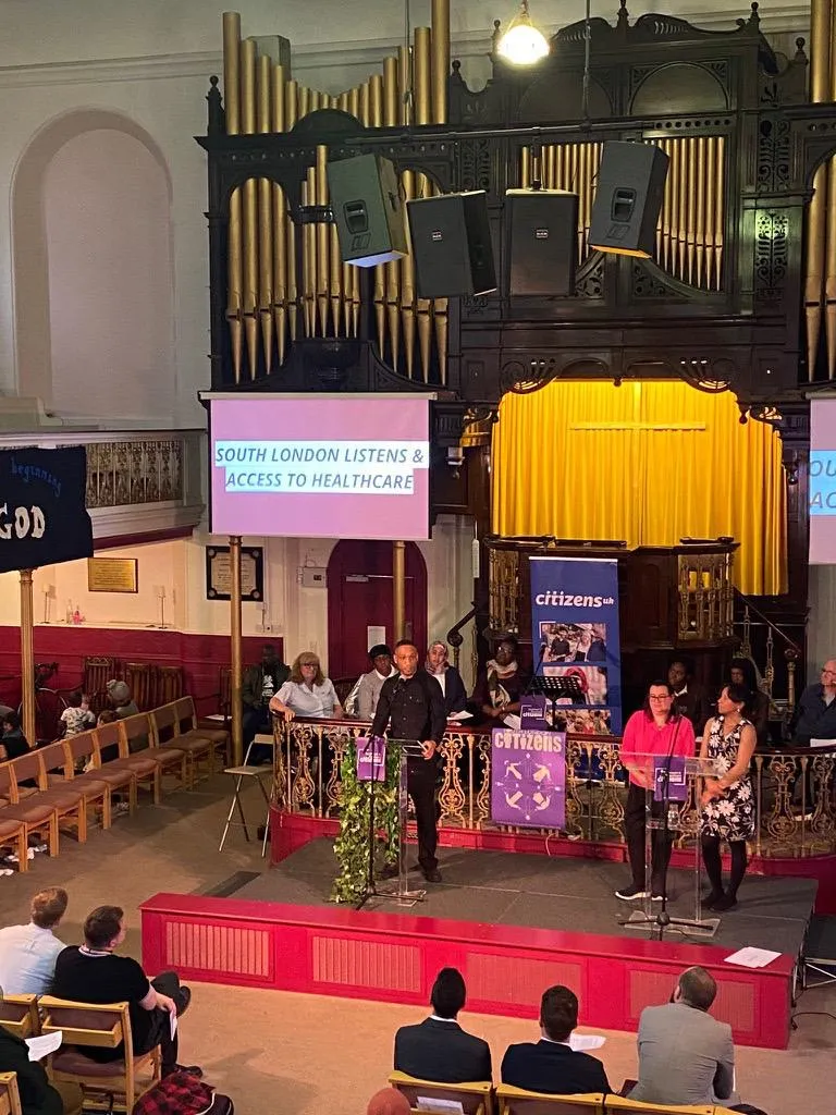 Image of Akeem Omar Ali presenting at the Southwark and Peckham accountability assembly. 