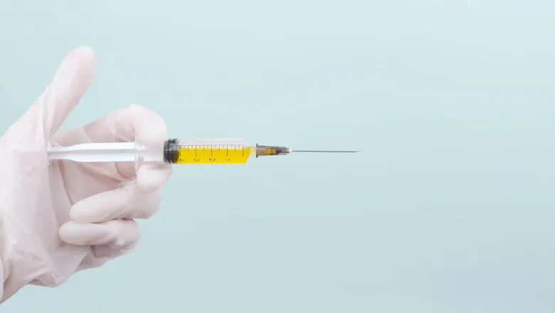 Covid Vaccine on Blue