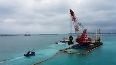 Excavators in the pacific ocean
