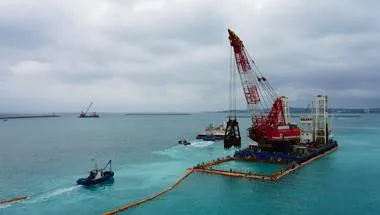 Excavators in the pacific ocean