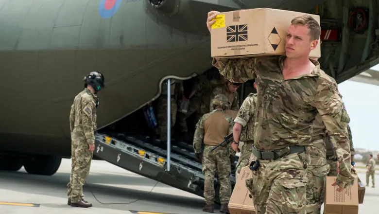 Military unloading aid supplies - Cpl Darren Legg RLC / MoD Crown