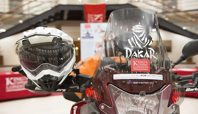 A motorbike and helmet with King's logo, at the Defence Academy