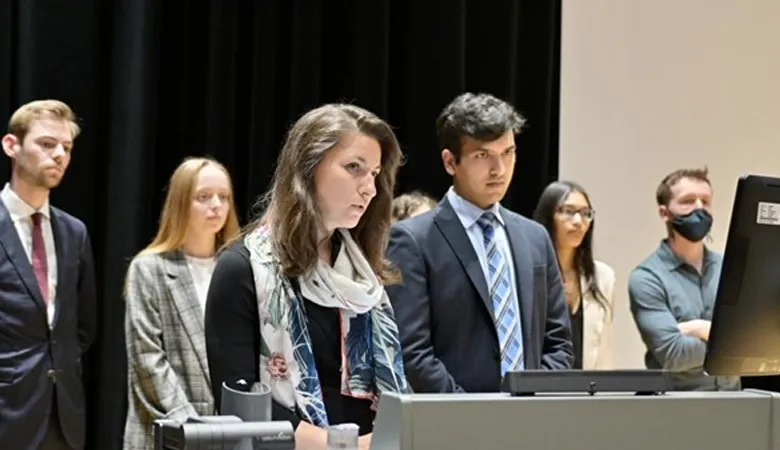 Students from the School of Security Studies present their declaration on the Defence of Europe to the conference.