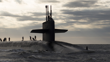Submarine with people on top of it SDP banner 1800x500
