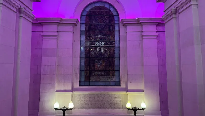 Stained glass window and ornate lighting