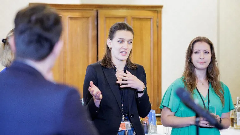 Members of the research programme discussing their work on the programme