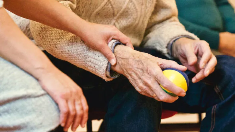 Person holding the wrist of another person