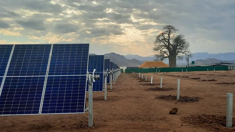 solar construction site in Malawi with a boabab tree