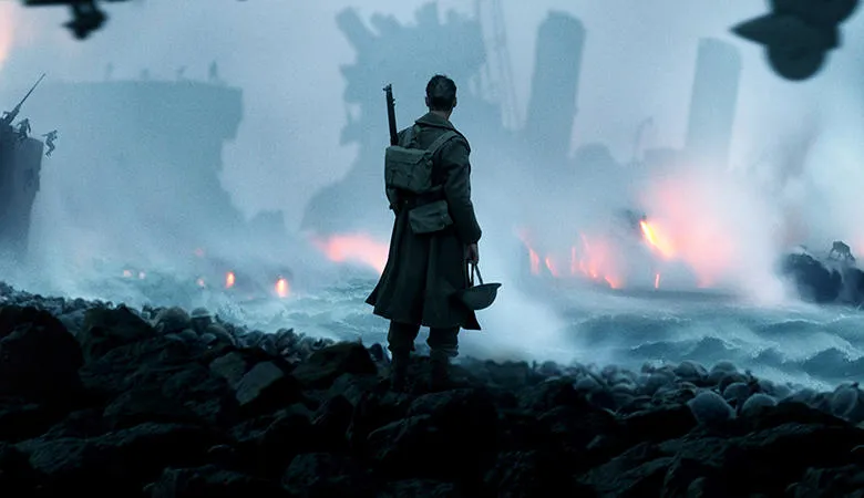 A soldier standing on the beach in Christopher Nolan's film, 'Dunkirk'. 